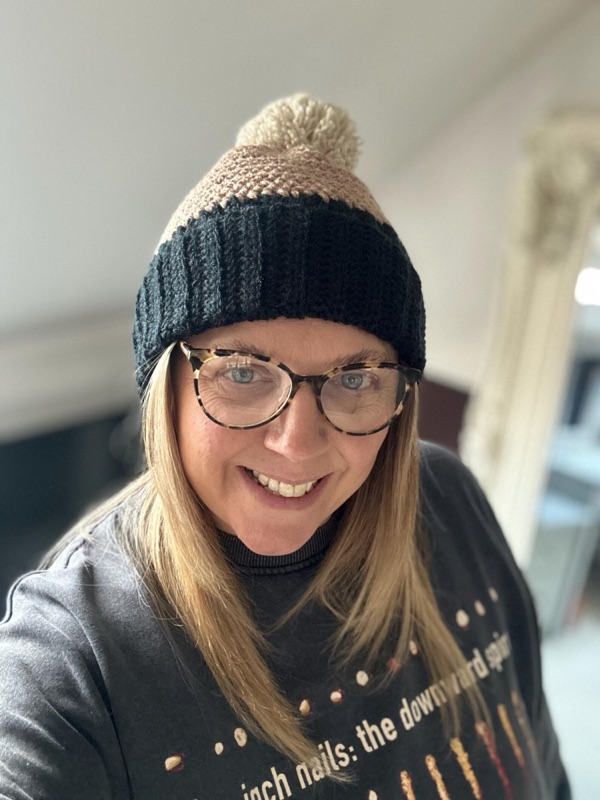 Rebecca from Imperfect Knots wearing a crochet bobble hat